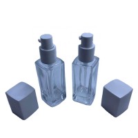 Hot sell luxury essential oil glass bottle,1oz glass square thick lotion bottle with pump, 30ml cosmetic glass package