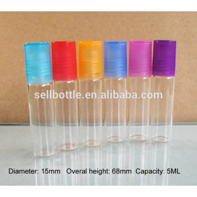 clear glass roll on 5ml bottle with blue/red/orange cap